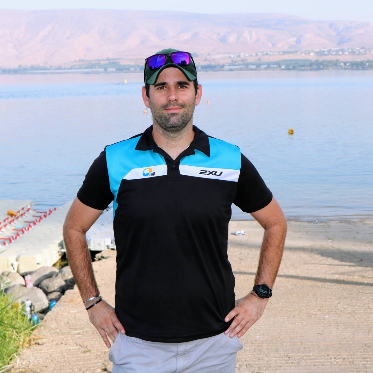 Coach Ido by the water